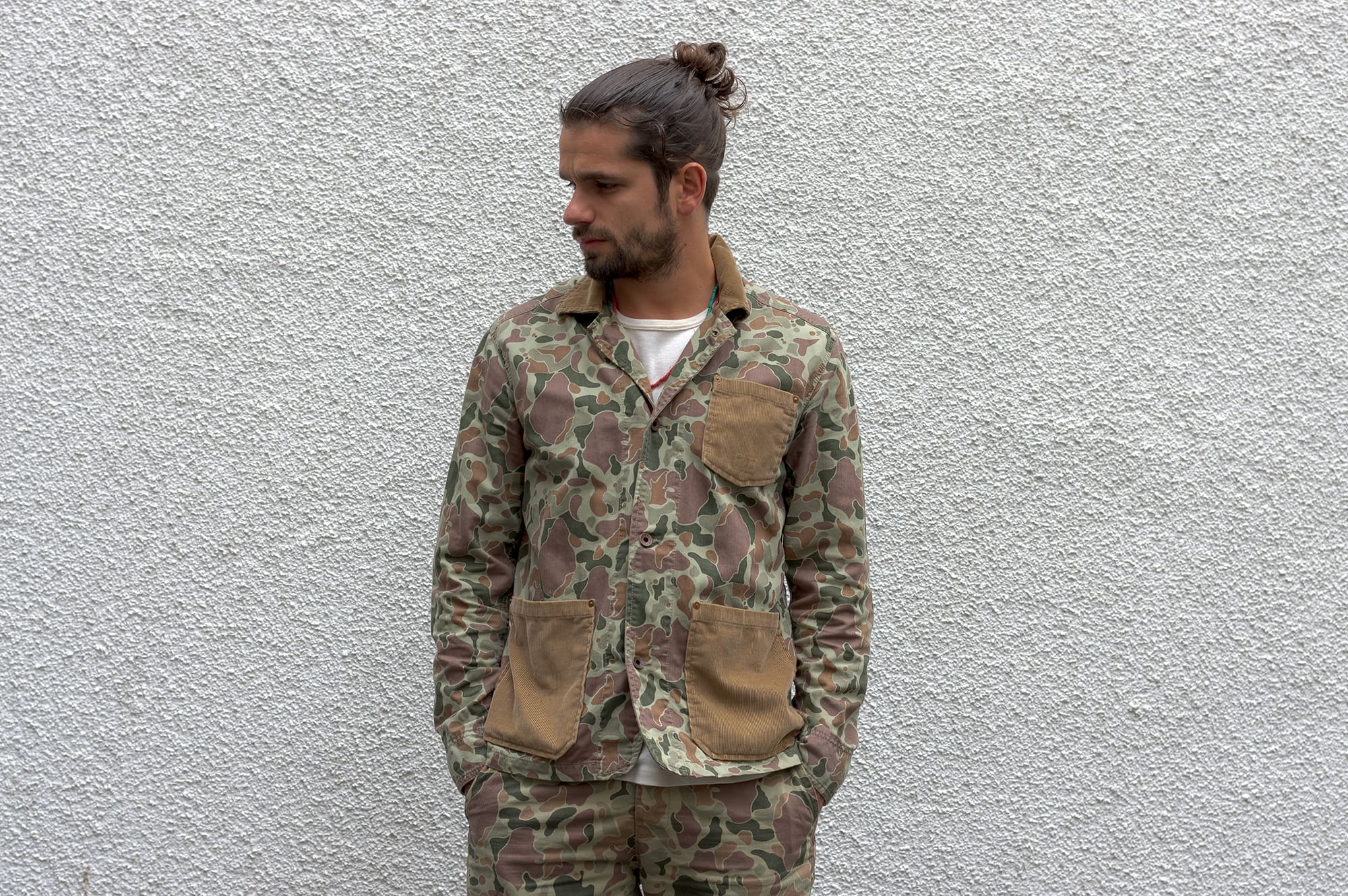 workwear oufit from edwin denim brand with a camo pattern and visvim virgil boots