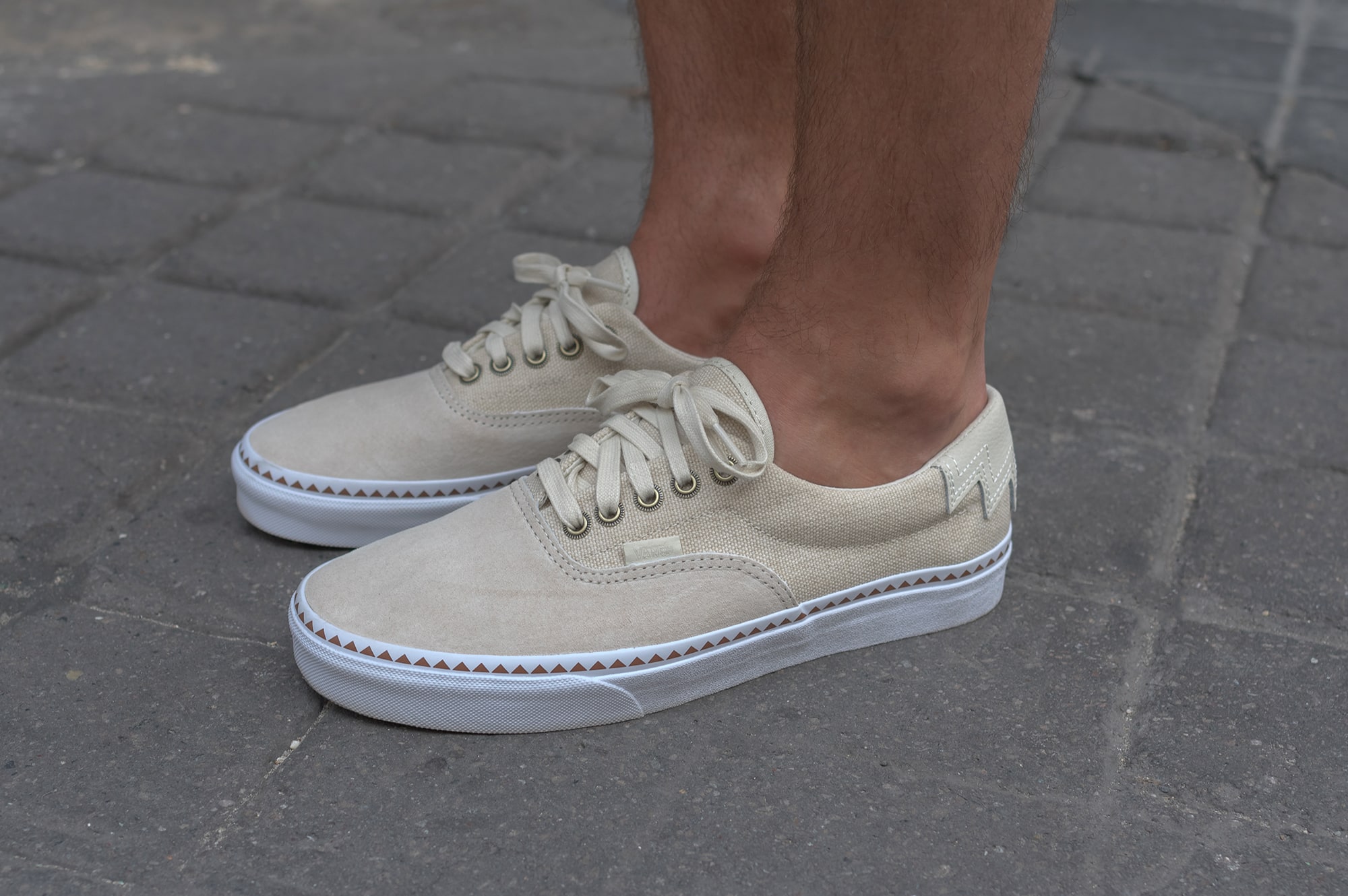 Noragi shuren projects in street heritage style with vans era native. sneakers and denim destroyed shorts