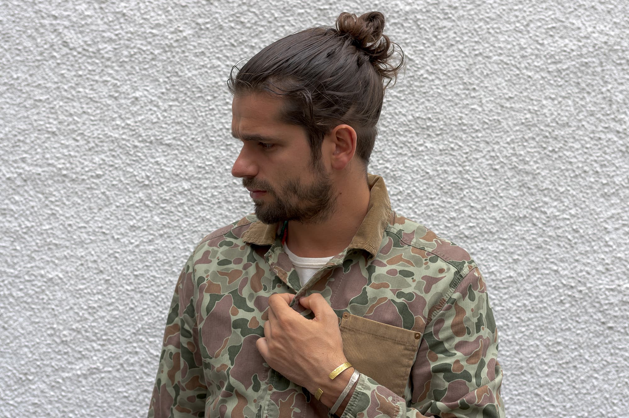 workwear oufit from edwin denim brand with a camo pattern and visvim virgil boots