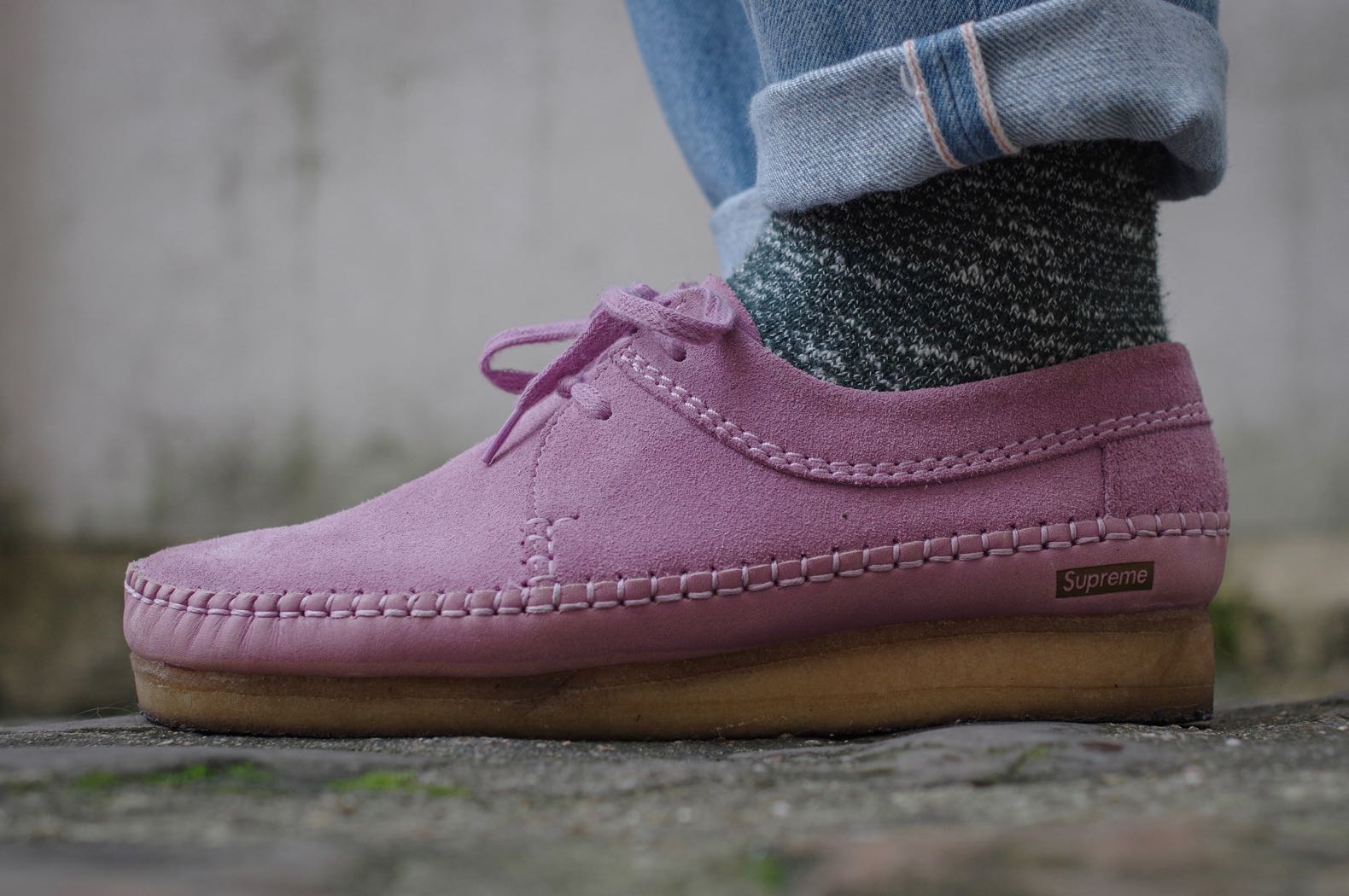 calrks collaboration with Supreme on Wevber pink model