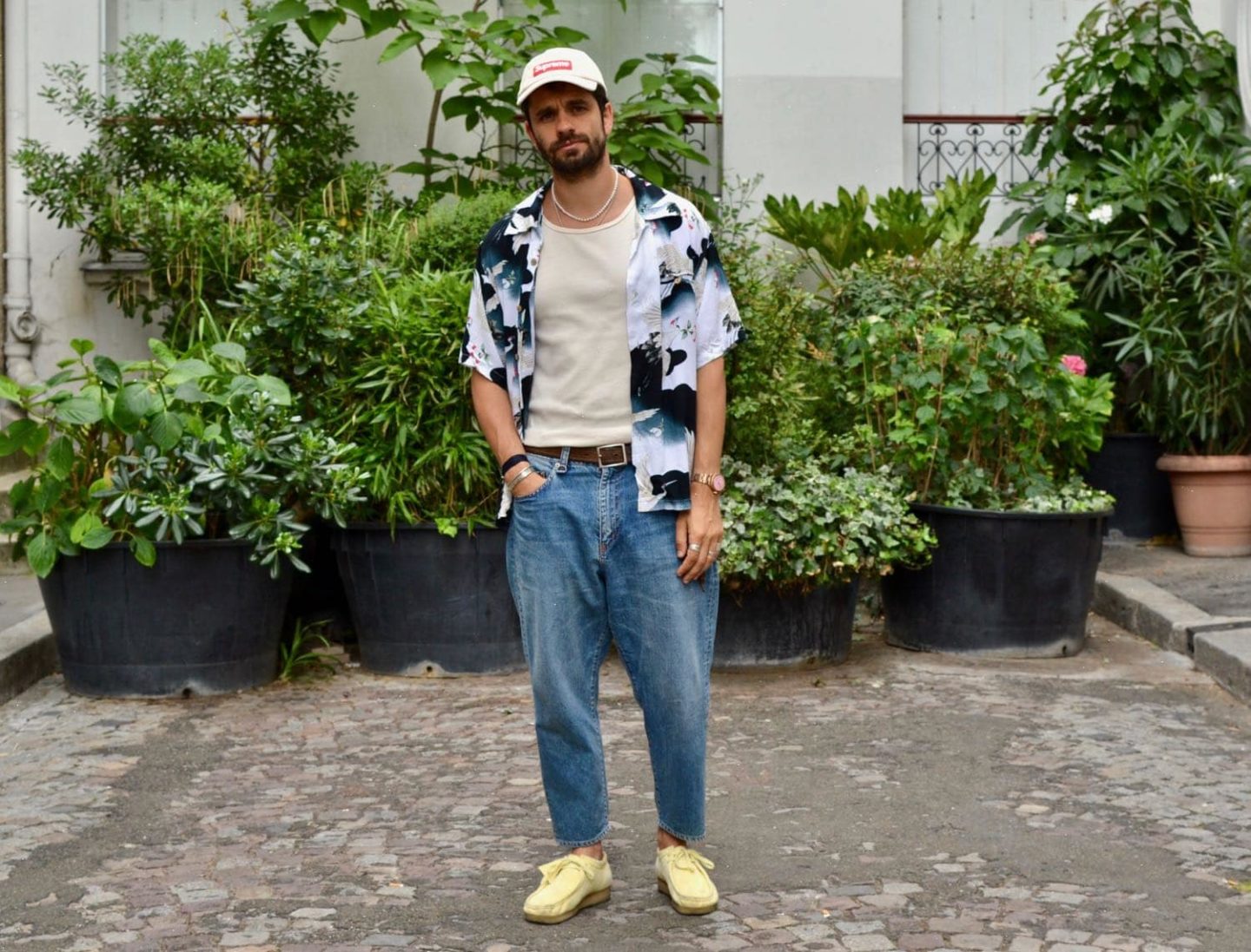 look men with aloha shirt vintage, tank top and bleach jeans on clarks wallabees yellow