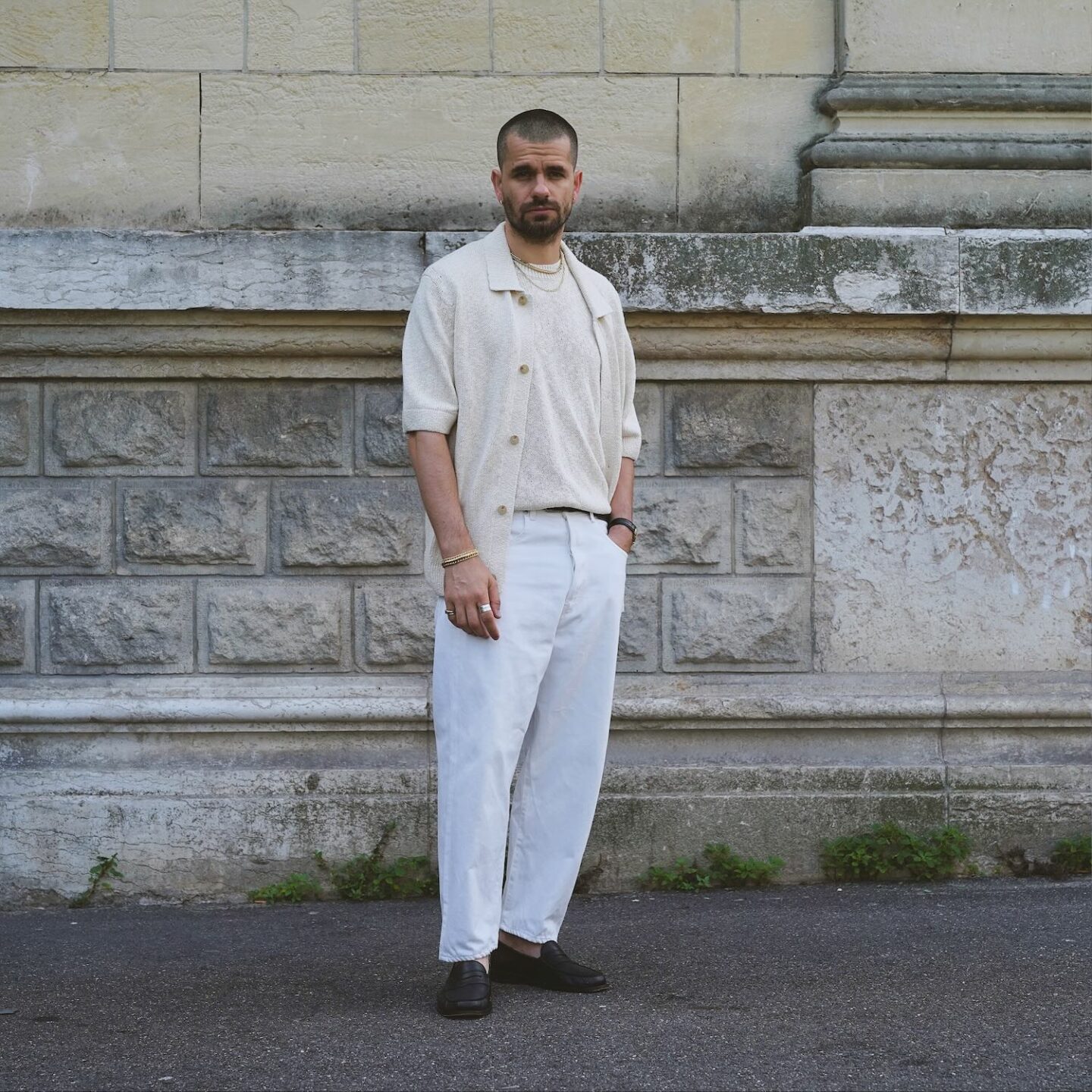 high waist loose tapered jeans from the french brand Borali, worn with black malfroid Loafers and knitted shirt from cos