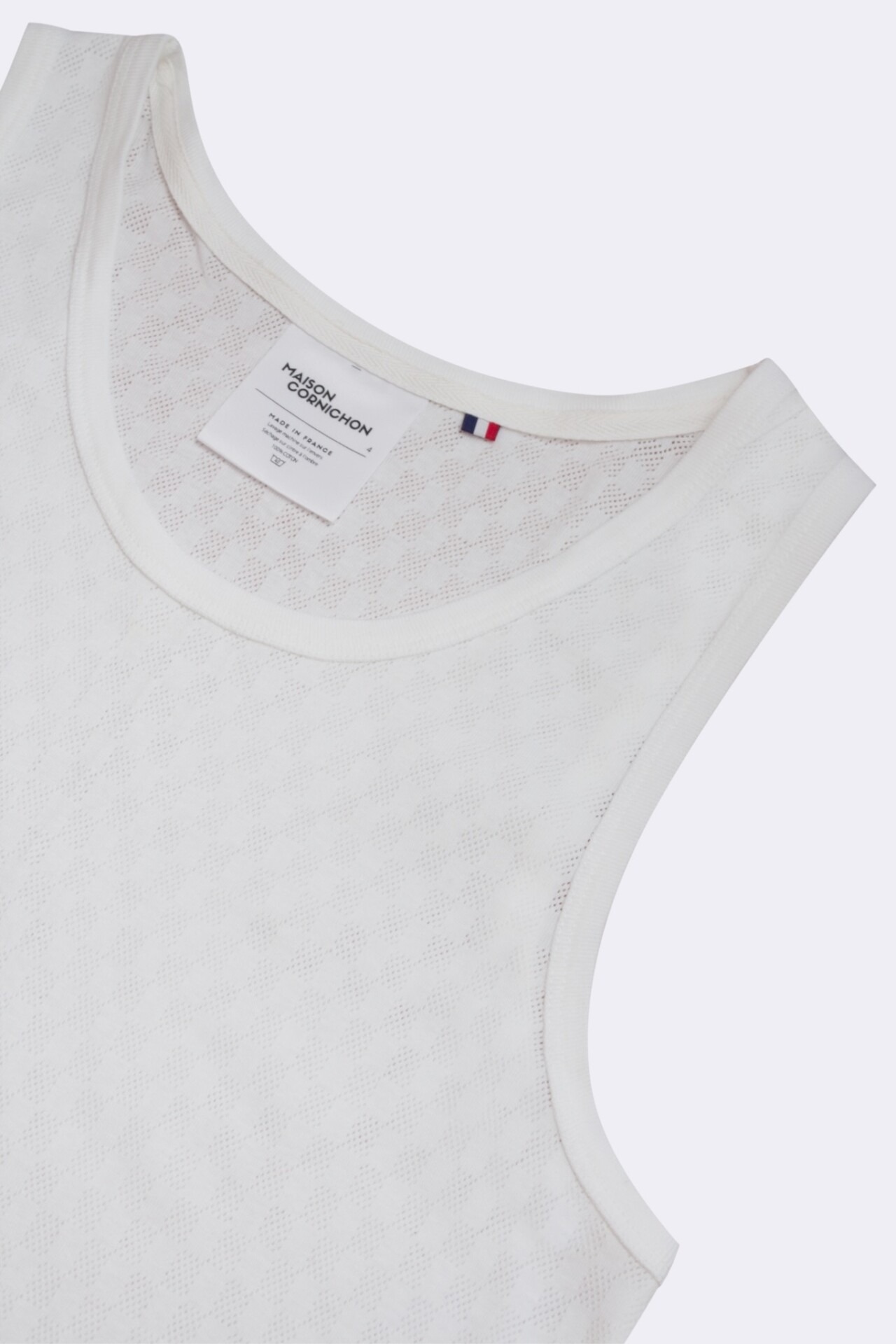 débardeur pour homme type maillot de corps en maille ajourée fait en france par Maison Cornichon et le styliste Boras