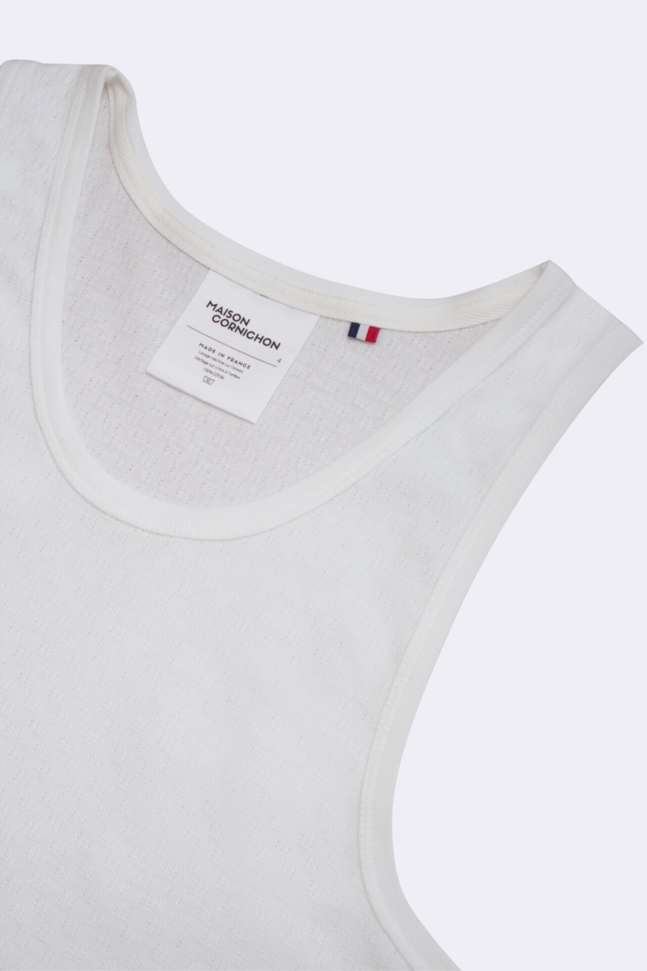 débardeur pour homme type maillot de corps en maille ajourée fait en france par Maison Cornichon et le styliste Boras