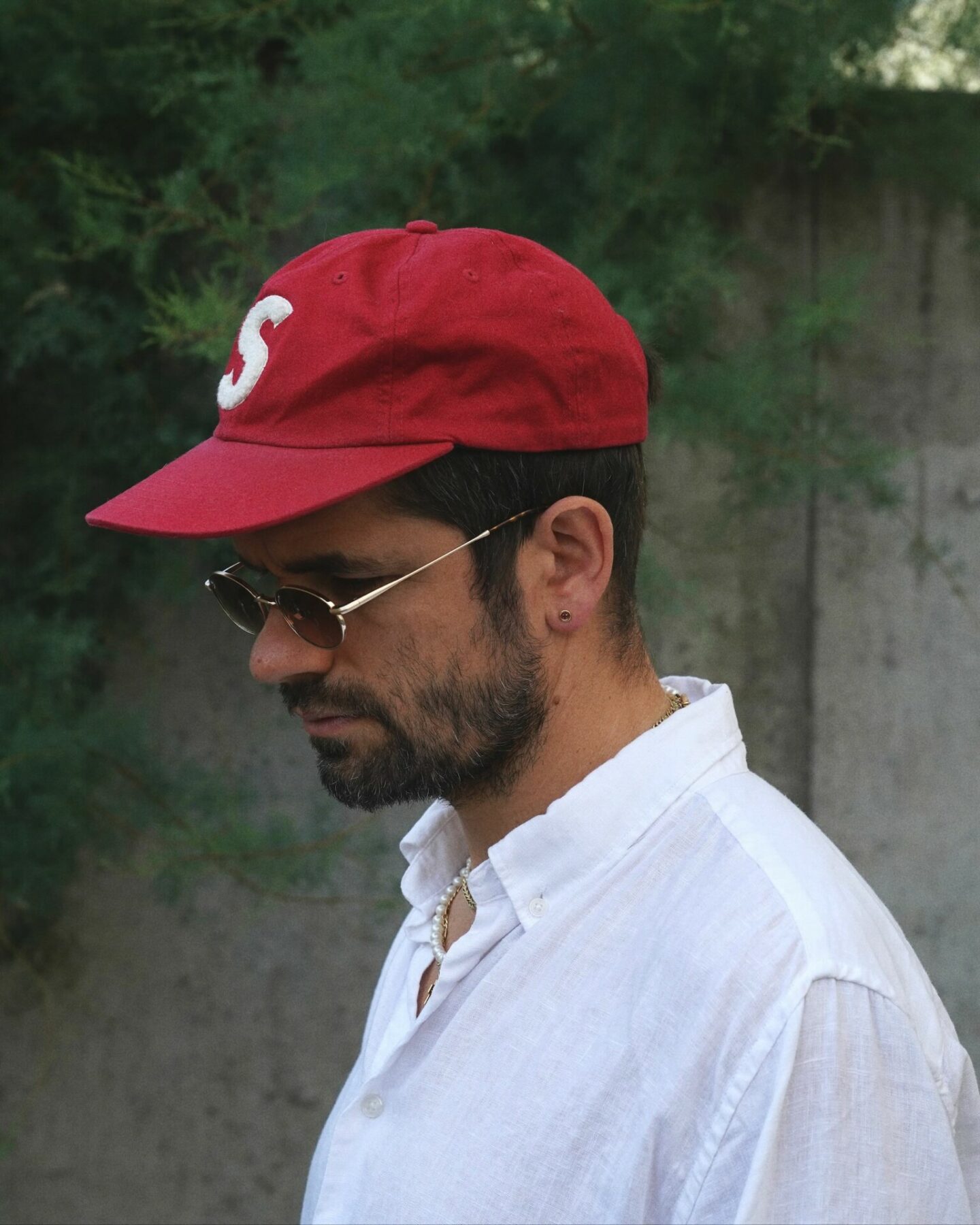 lunettes de soleil Meti et casquette supreme 6 panel varsity logo
